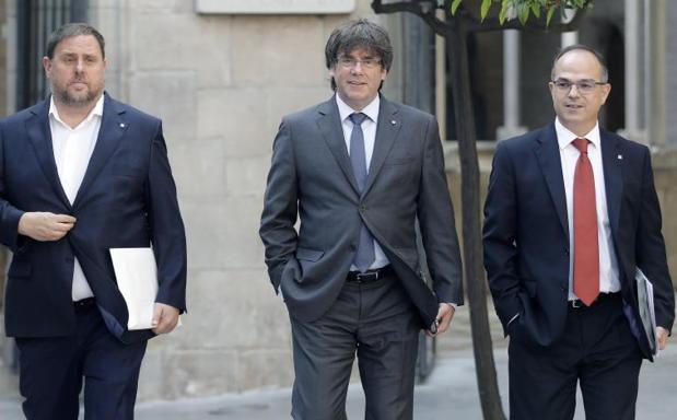 Oriol Junqueras, Carles Puigdemont y Jordi Turull.