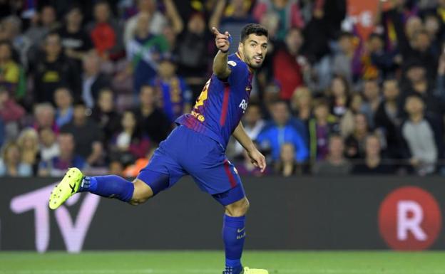 Luis Suárez celebra su gol ante el Espanyol.