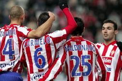Los jugadores del Sporting de Gijón, celebran su tercer gol / EFE/